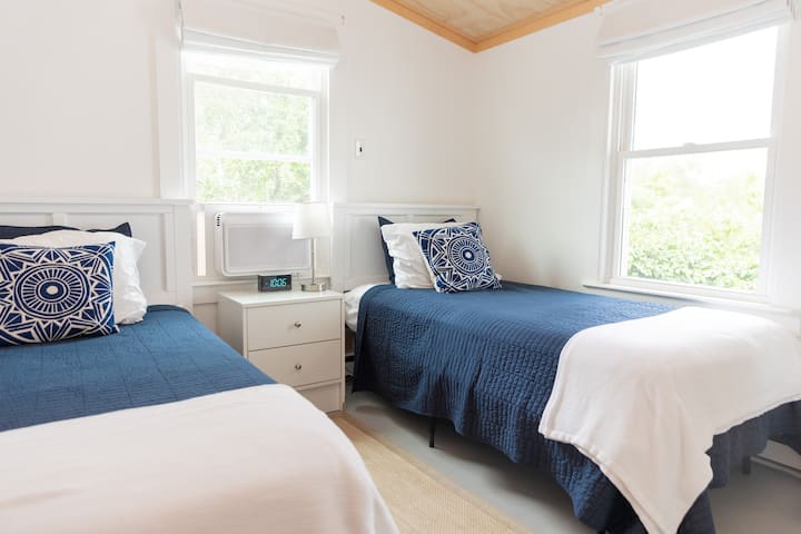 Downstairs small bedroom. 2 twin beds; great for kids.