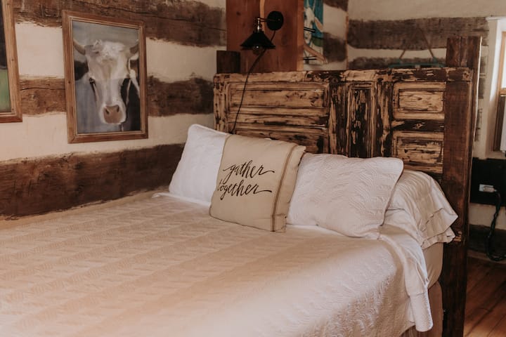 Rustic charm meets modern comfort in Bedroom #3. The guests of this room have a full size room, queen bed, desk area and access to the 3rd floor viewing area. It shares a full bathroom with bedroom #2. A great room for these guests!