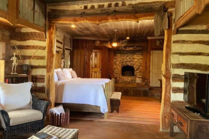 Off the living room, you walk into the sitting area with attached master bedroom and master bathroom. These adjoining rooms offer 2 fireplaces (1 in master bedroom and 1 in master bathroom), television, closet, dresser and beautiful decor. 