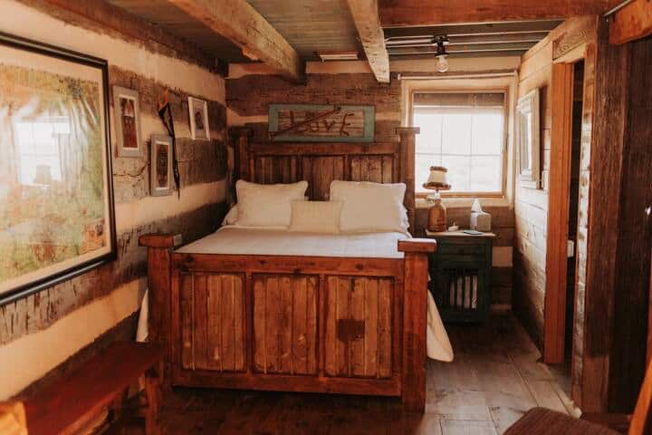 Up the rounded staircase, you come to bedroom #2. An oversized room, with queen bed, closet, tv, and plenty of space to stretch out. This room shares a full-size bathroom with bedroom #3