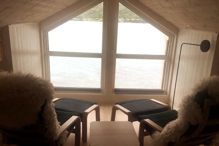 Sitting area on the open loft with a fantastic view of the sea