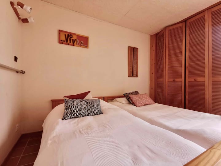 Garden floor:  open to terrace, 2 single beds