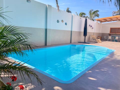 Nice beach house + WIFI, swimming pool and green areas