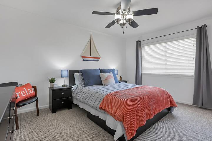 Main floor bedroom with blackout curtains