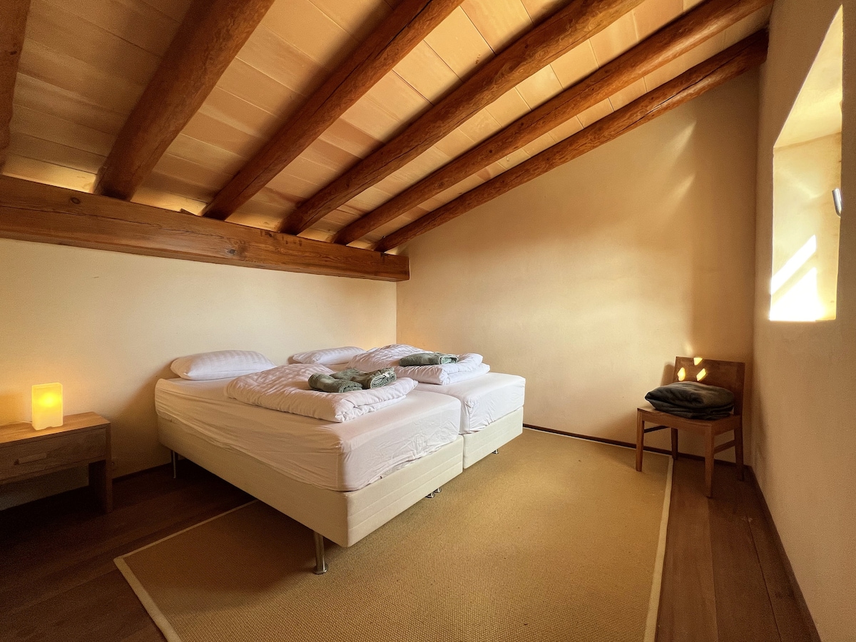 The sea view suites each have a separate bedroom with 2 single beds above the bathrooms