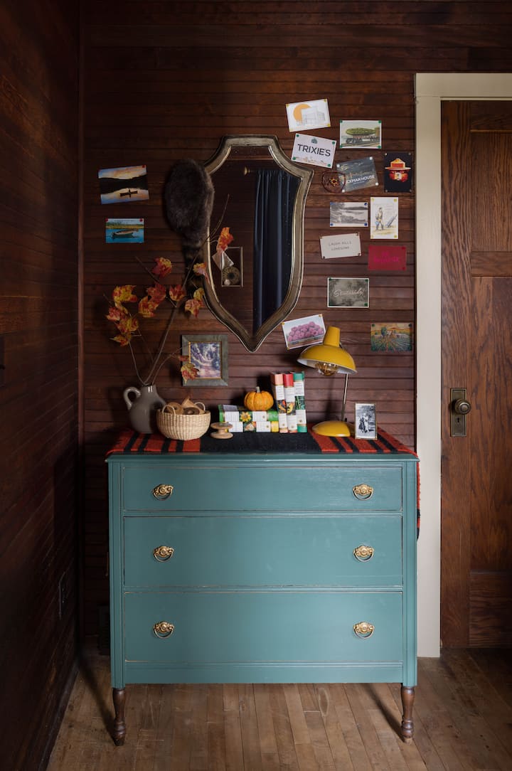 The postcard collection, as seen in Country Living magazine, is displayed in a main floor bedroom and always growing!