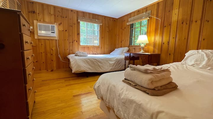 Bedroom #2 has 2 twin beds and an in-wall AC unit for added comfort. 