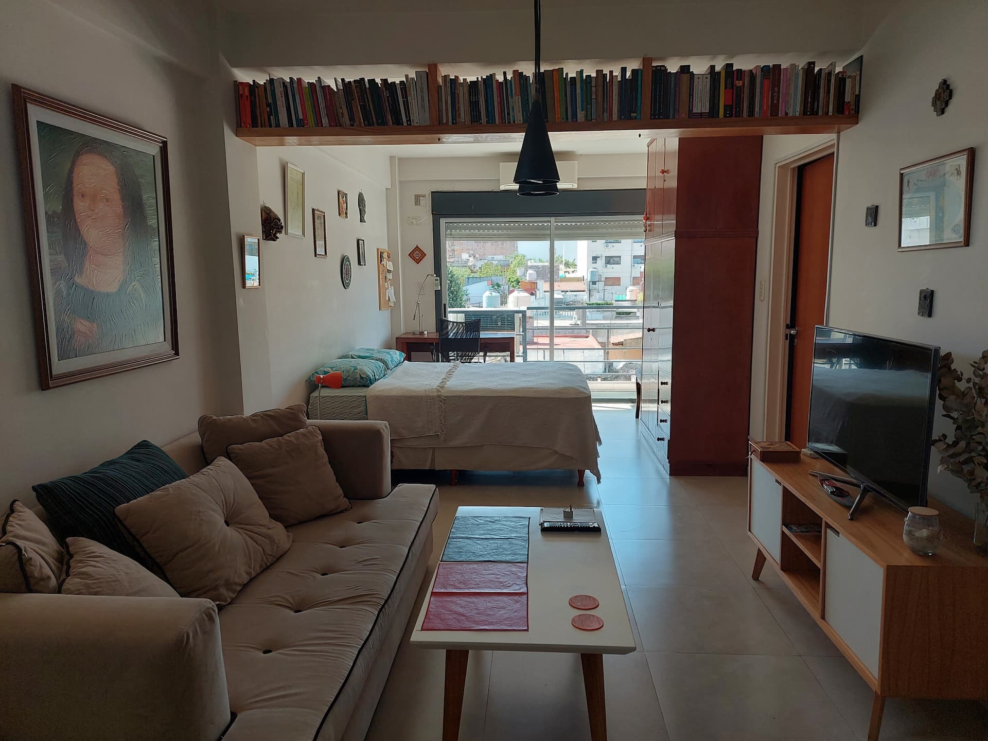 Researcher rents his bright & modern apartment