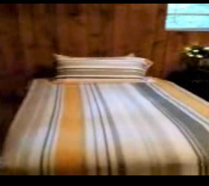 Guest BR features two twines (that can be pushed together to create a king bed). New mattresses and flooring. Large wardrobe to store your travel gear.
