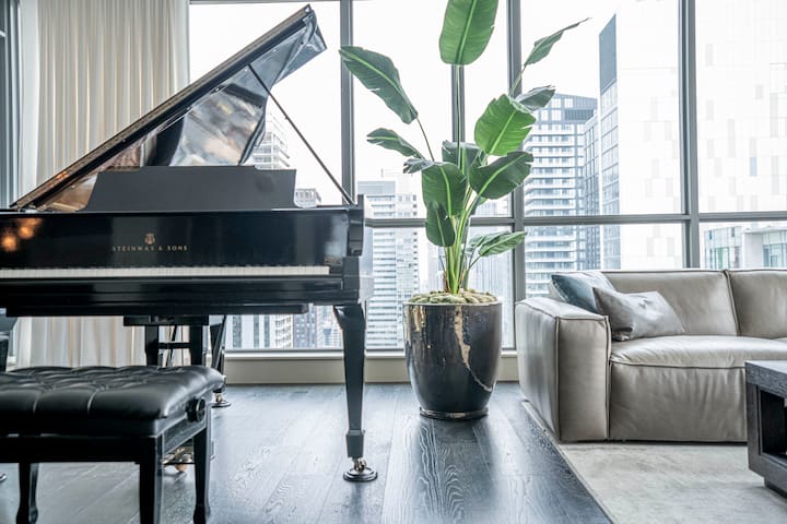 Designer Penthouse with Grand Piano & Lake Views