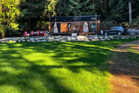 Tiny home nestled in the woods
