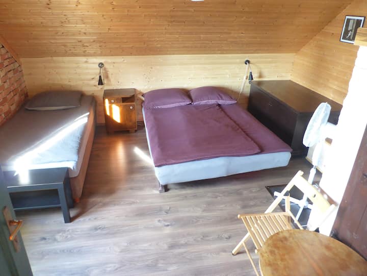 Bedroom in the attic for 3 people. This room has also a real air conditioner, not just a fan, but you can use one or another.