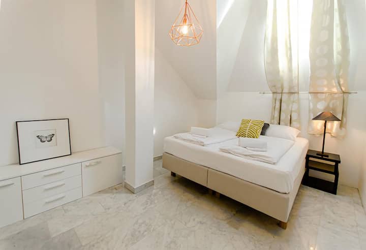1st bedroom with a Queensize bed