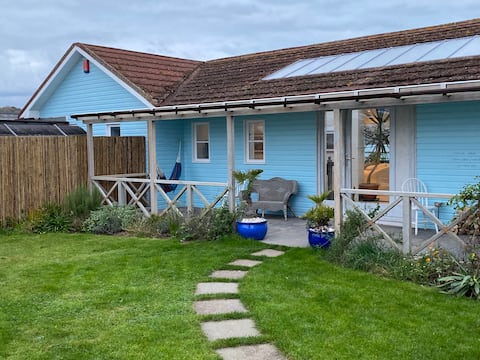 Private steps down onto the sand.