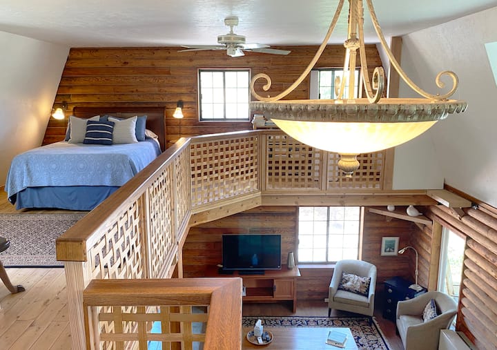 North loft bedroom with queen bed. Notice the open nature of the loft bedrooms to the rest of the house.