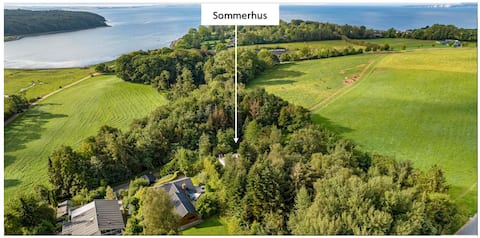 Summer cottage on a natural plot and close to the water.