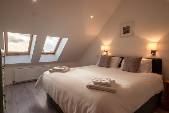 Recarga las baterías relajándote en esta hermosa habitación relajante.