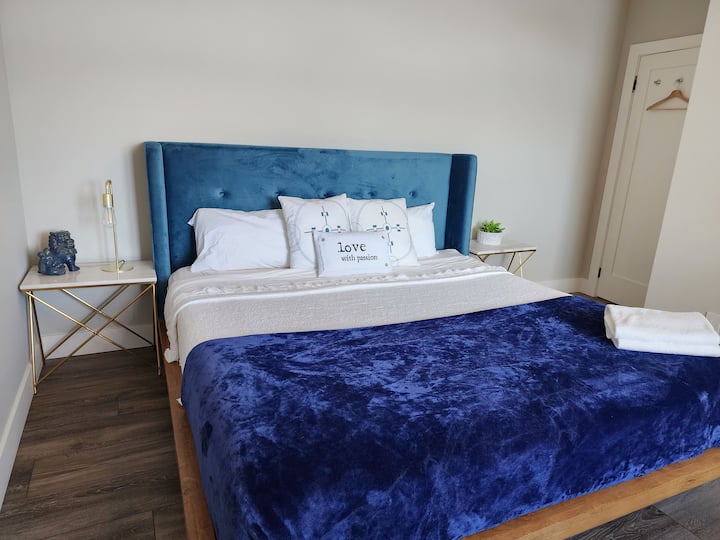 3rd Bedroom in Lower Level with king bed and window facing the lake. 