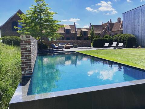 Luxury home among fields with pool & hot tub
