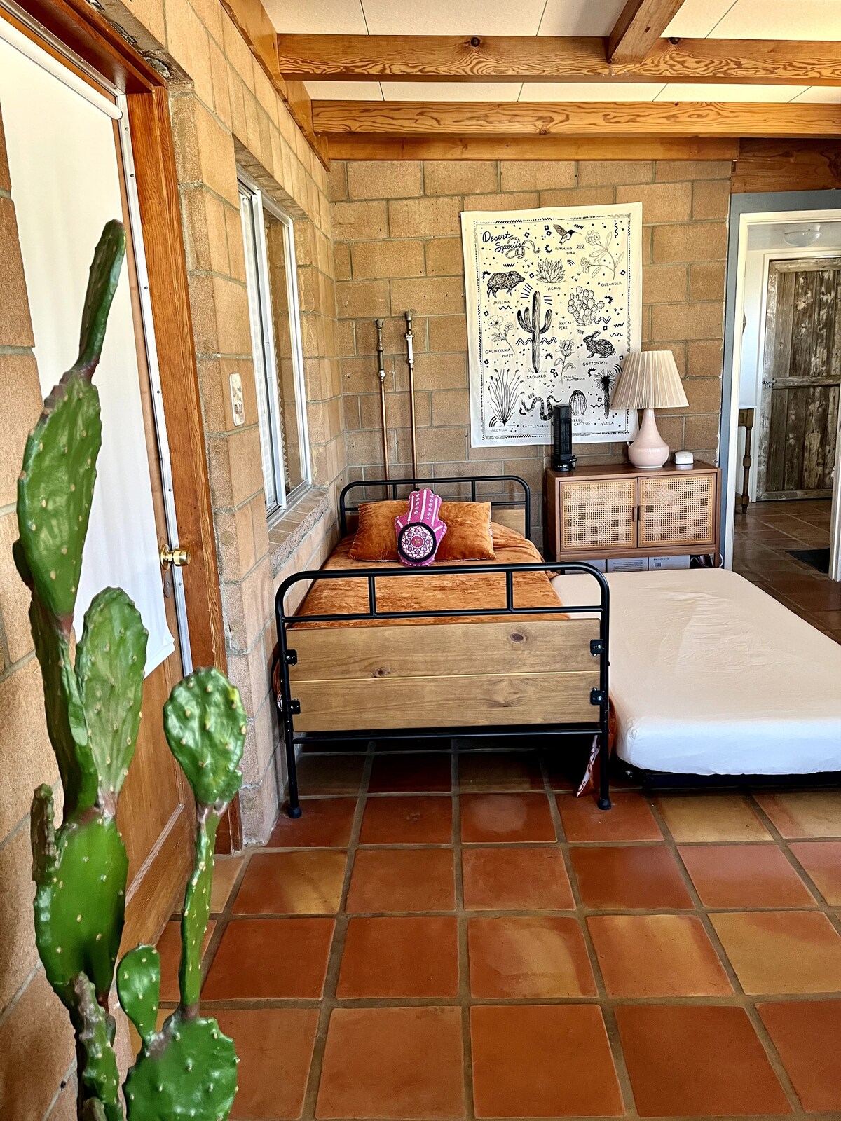 Trundle bed with 2 single beds (1 bed underneath). There’s a total of 4 single beds in this room. 