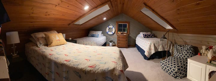 Children especially enjoy the Loft hideaway, with three twin beds, skylights, and a comfy bean bag chair.