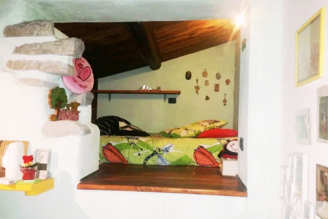 חדר שינה בעליית גג עם פוטון