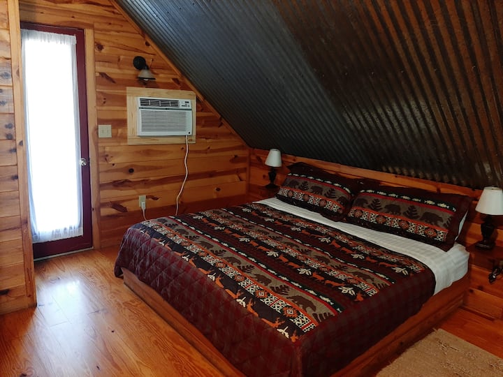 Upstairs king bed & balcony & stairs