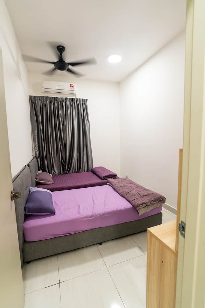 First room on the right with 2 single bed, a cupboard and a make-up table which can also be used as a work station.