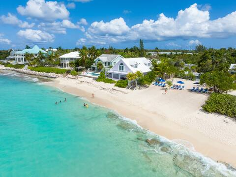 7 Mile Beach Penthouse Style + Private Beach Club