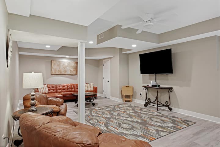 Additional living area in lower level off of the billiards room provides more seating and another 65" UHD 4k Smart TV. This one also includes a Nintendo Wii.