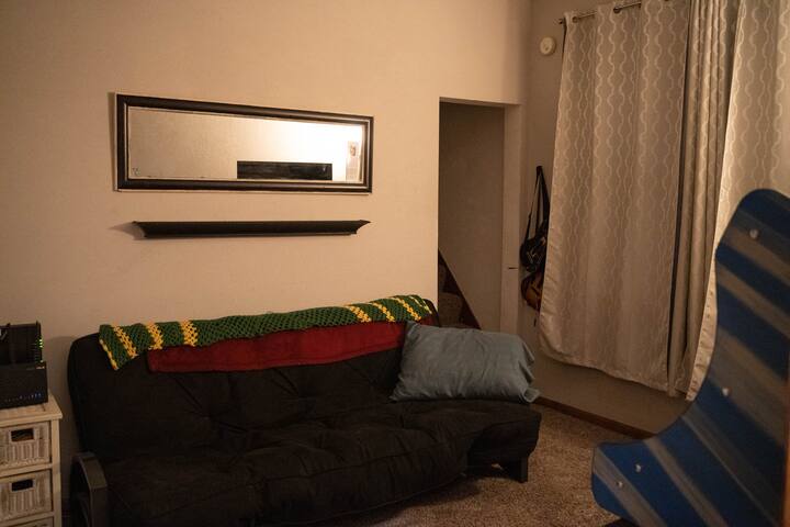 Sitting / game room (doubles as 3rd pass-through bedroom w/ 8 inch coil spring futon).
