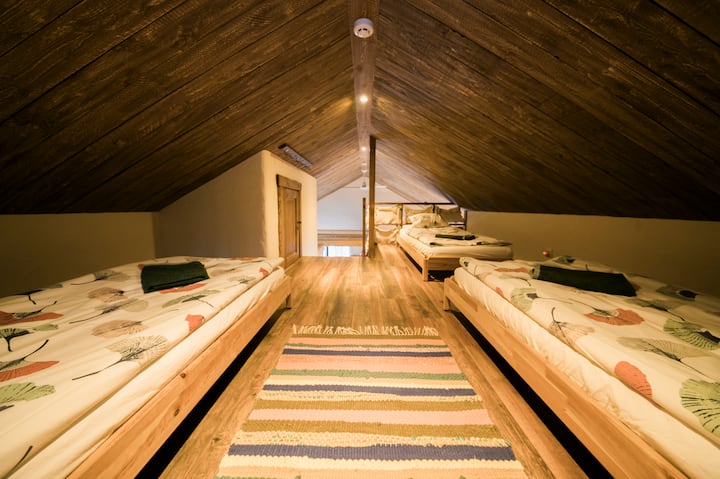 3 single beds upstairs in the main house