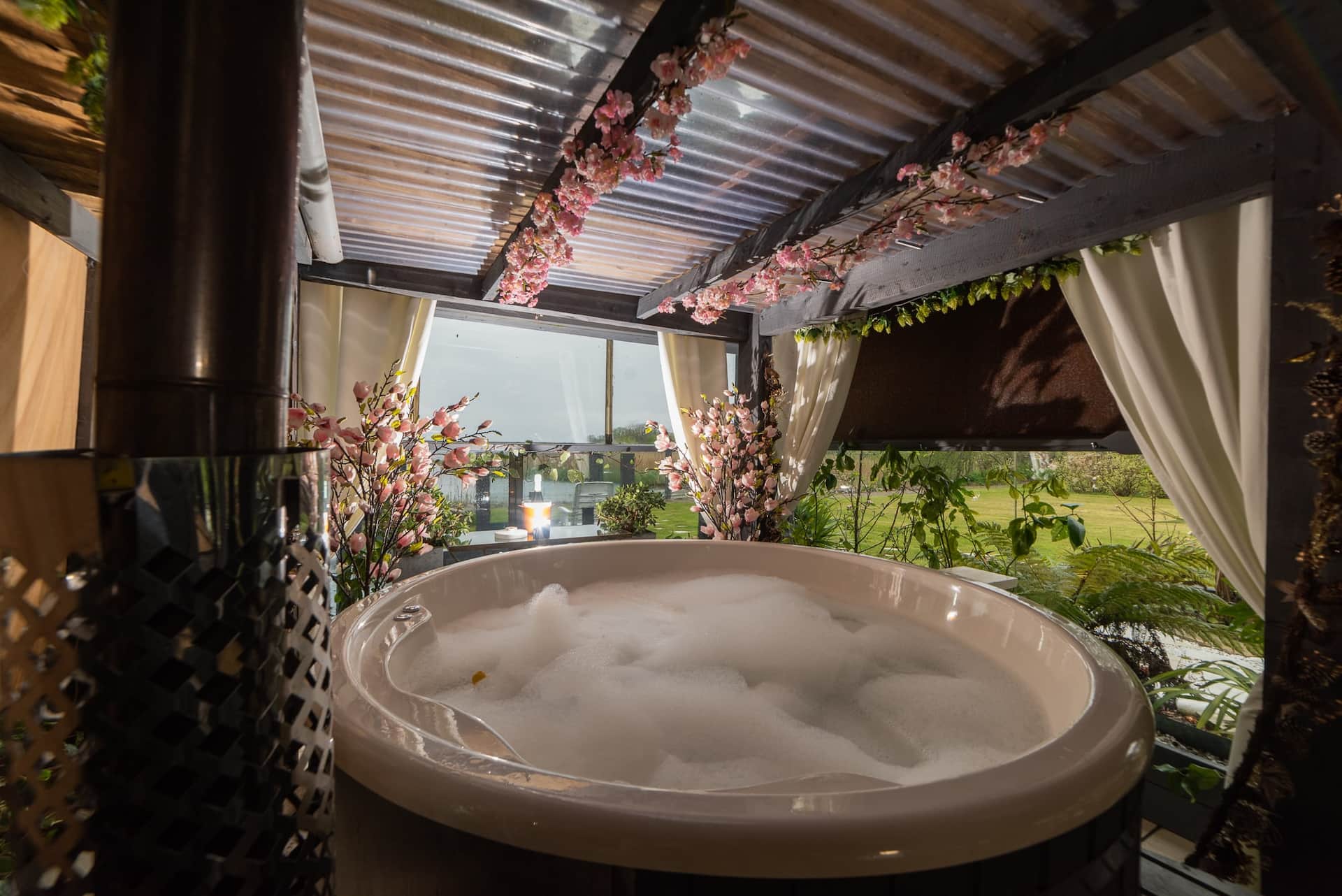 One of the two hot tubs at Selshan Lodge