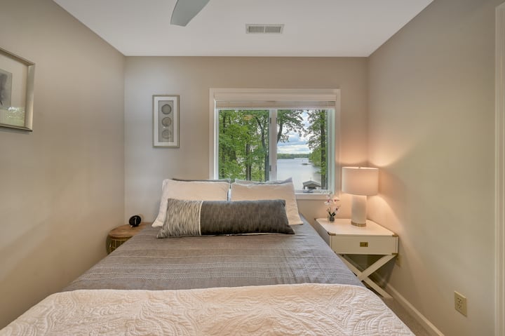 Bedroom 1  has a Queen bed and a lovely lake view
