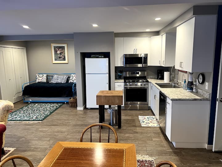 Garden level kitchen and twin trundle bed.
