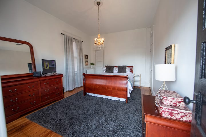 Larger of 2 back bedrooms.Dish tv and 
USB charger on gold lamp.