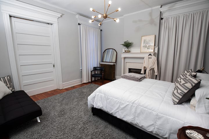 Large downstairs bedroom.  Queen Bed &daybed.  1/2 bath across from bedroom with laundry and full bath off kitchen.