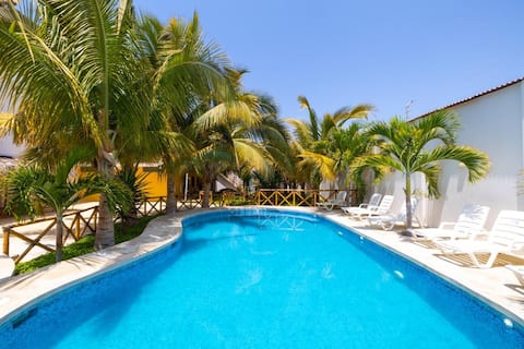 Luxury Condo with Kitchen + Pool + AC, near Beach