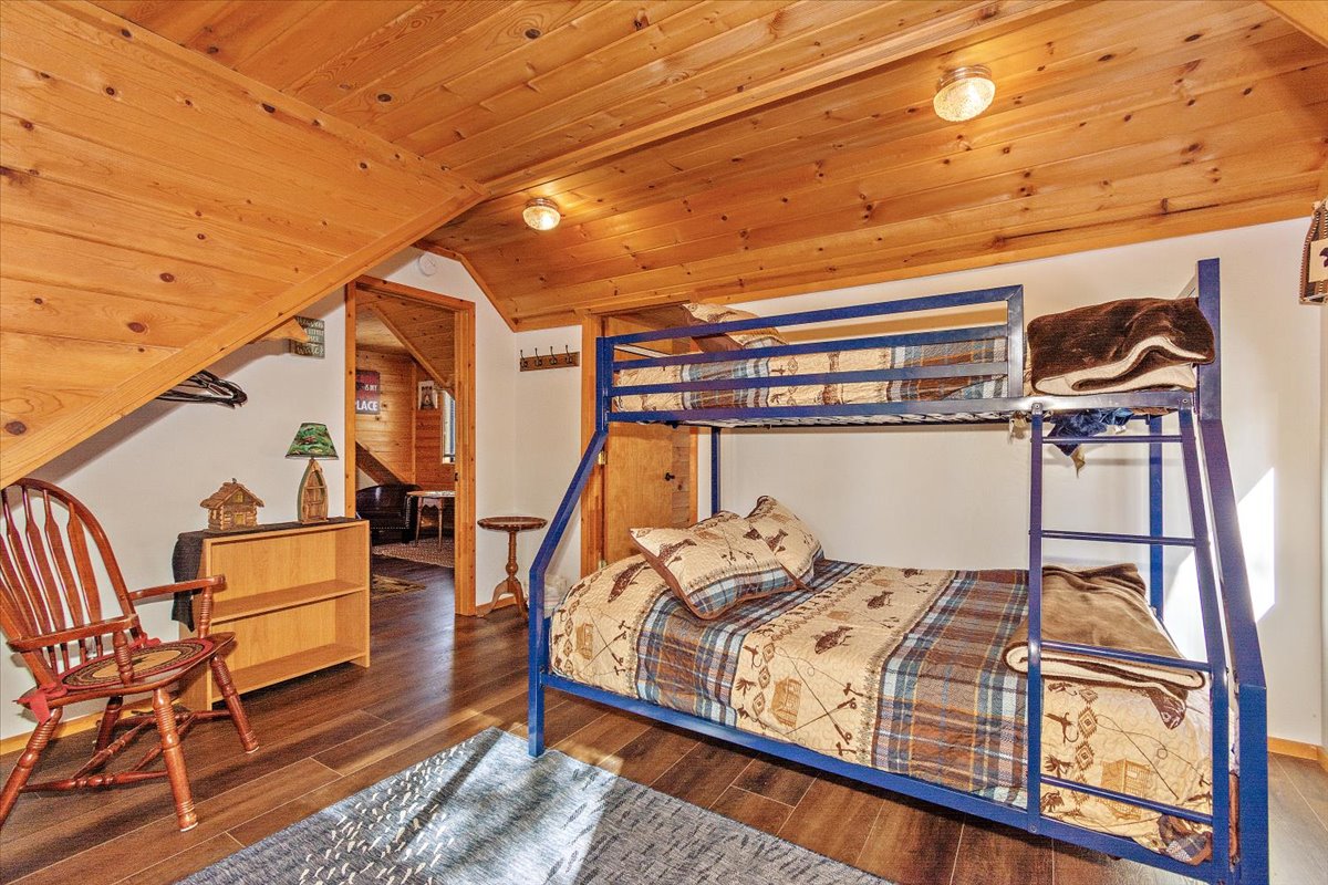 Upstairs bedroom with a twin over full sized bunkbed. This bedroom connects directly to the upstairs bedroom #1