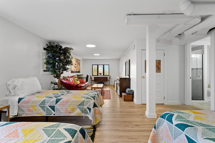 Spacious basement provides comfortable and lounge and secondary sleeping options