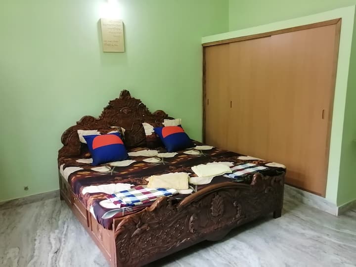 (3rd) Bedroom with Air conditioning, Iron/Ironing board, Side table , Hairdryer, mirror, fitted wardrobe and a Side Balcony