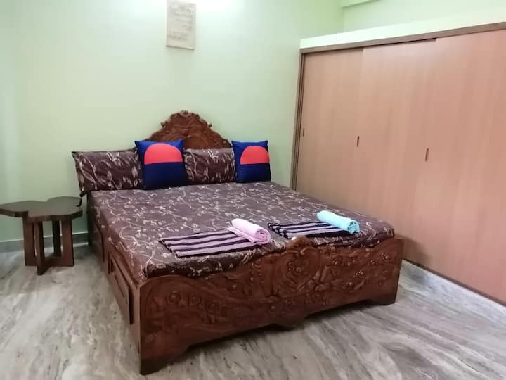 (4th) Bedroom has Air Conditioning, En suite Bathroom with a bathtub, Hairdryer, Side table, Mirror, Wardrobe, Iron and Ironing board, Side balcony and table lamp