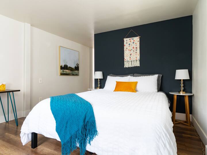 Private 1 bedroom, 1 bathroom suite complete with a convenient kitchenette (includes a mini-fridge, microwave, electric kettle & dishes/silverware!), desk, AC & much more!