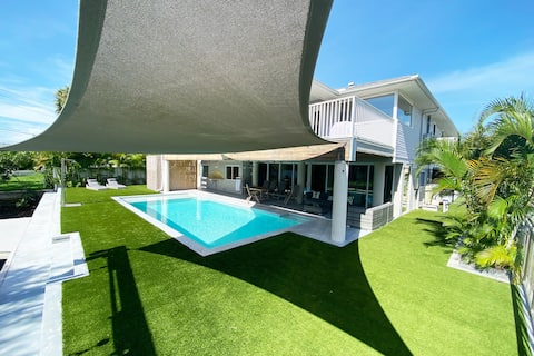 3900 sqft waterfront home, heated pool, near beach