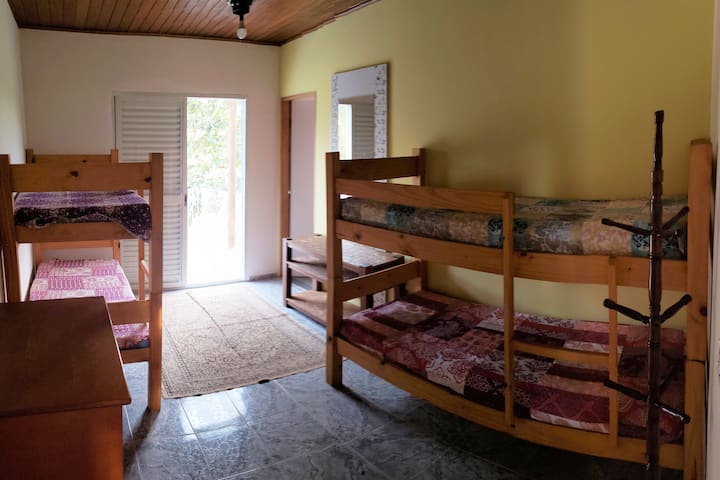 The en-suite kisses flower with two bunk beds.