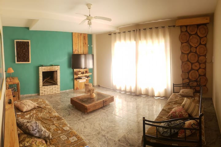 Next to the kitchen, the living room.
