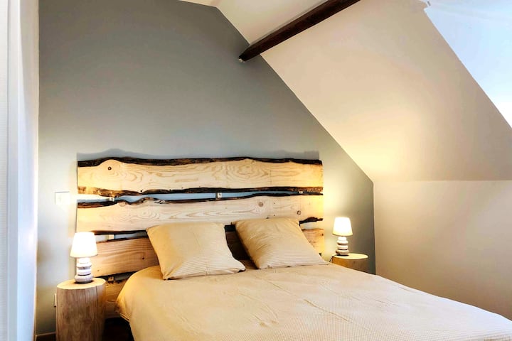 Bedroom with double bed overlooking the harbor