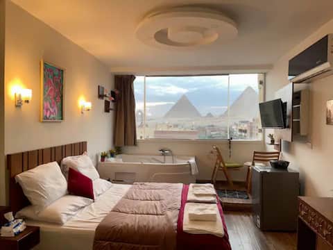 Апартамент с нощувка и джакузи По гледка към слънчевите пирамиди