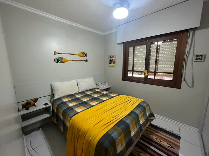 Bedroom - window view and bed