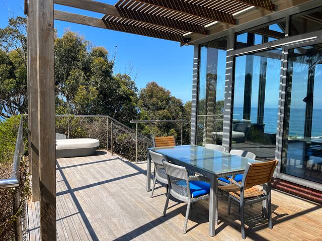 Ocean-side retreat with bush & farm views gallery image 5